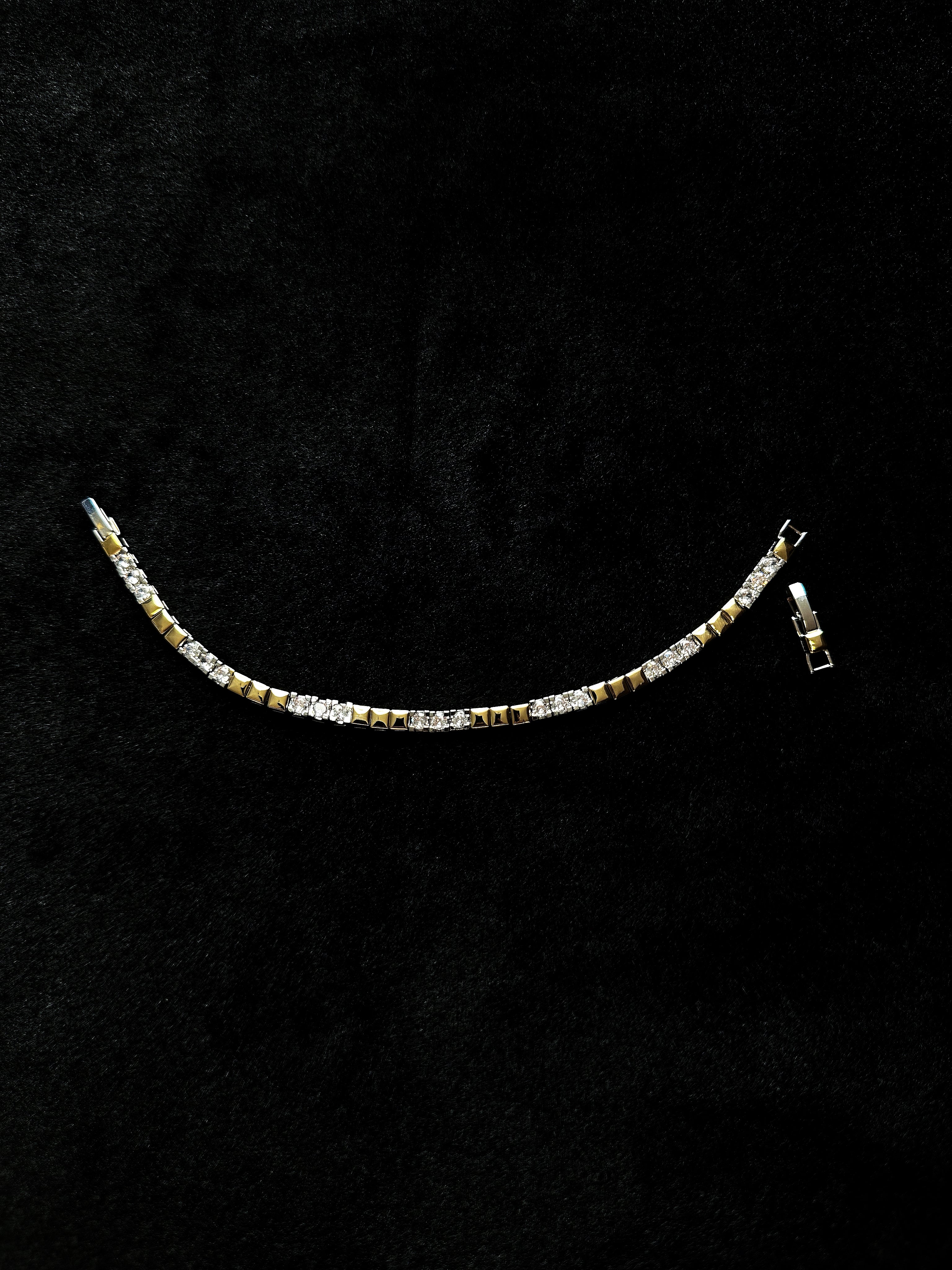TT original-bracelet-Designer gold and silver two-tone square diamond bracelet | Subtle luxury with a structured design | Evening accessory |