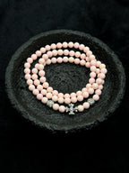 TT original-necklace-Pink round natural stone bead necklace | Vintage carved spacer bead necklace | Coral pink | Luxurious and flattering | Multiple ways to wear | Cross accessory