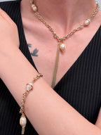 TT original-Bracelet-Women's Gold Pearl Bracelet | Chunky-chain vintage design featuring pearls and tassel charms | Elegant, luxurious statement jewelry