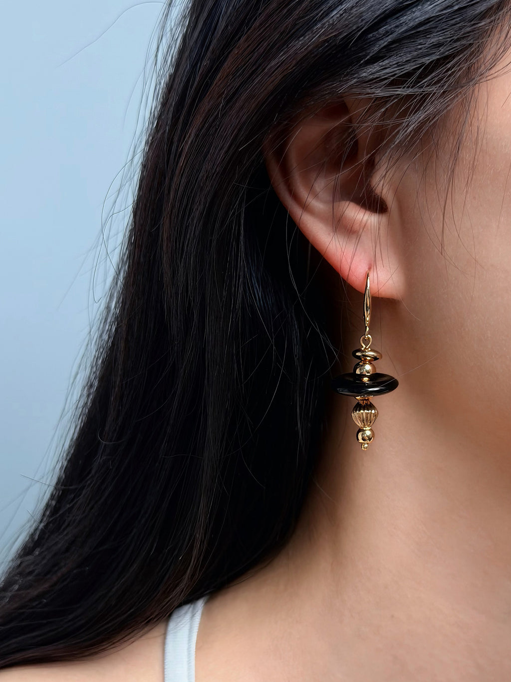 TT original-earring-Black onyx gold pendant earrings | Elegant and unique women's jewelry | French hook-shaped lantern pendant earrings