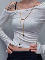 TT original-necklace-Understated luxury black and gold necklace | Gold braided long chain | Black gemstone tassel pendant | Stackable light luxury necklace