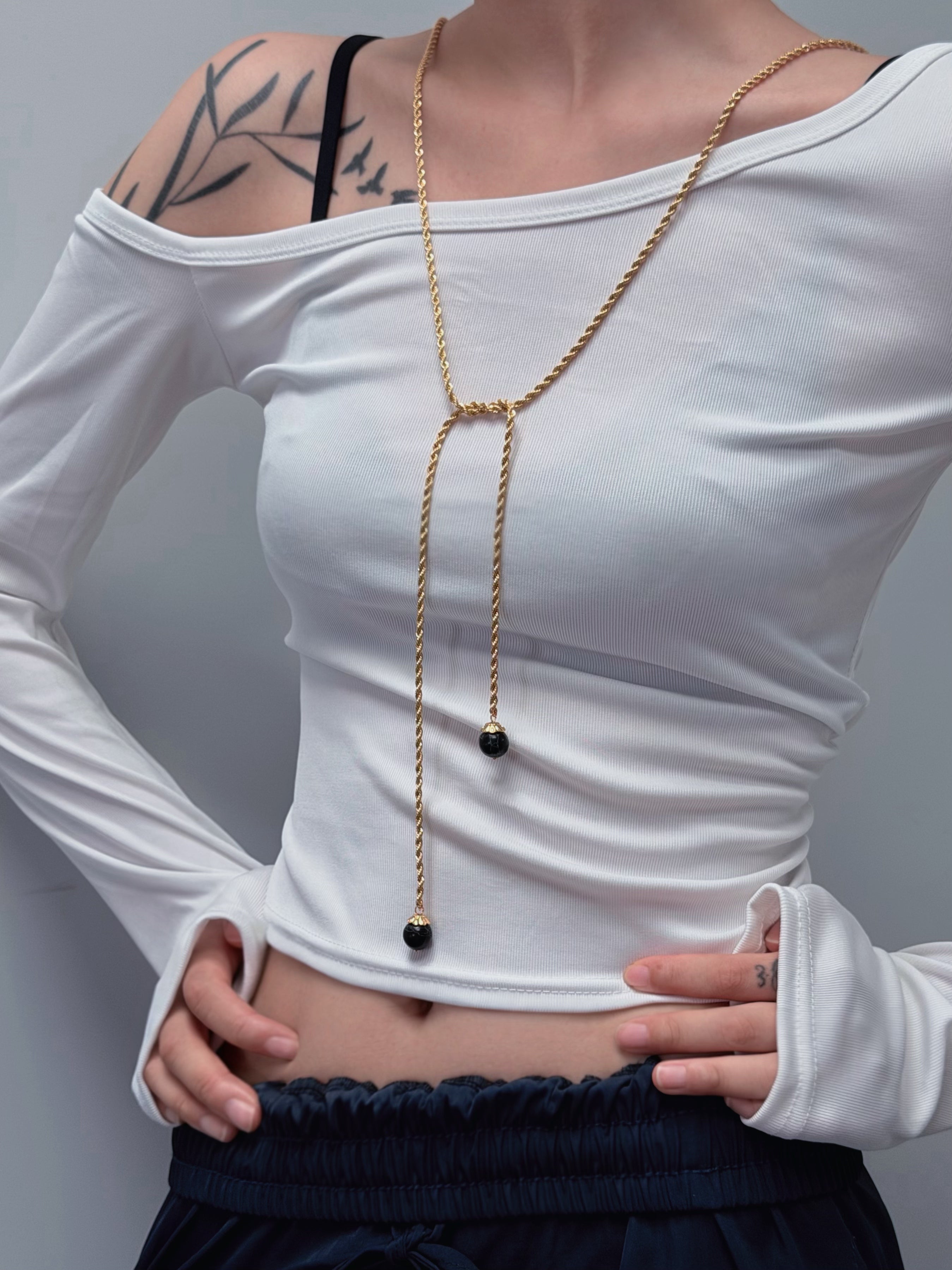 TT original-necklace-Understated luxury black and gold necklace | Gold braided long chain | Black gemstone tassel pendant | Stackable light luxury necklace