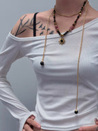 TT original-necklace-Understated luxury black and gold necklace | Gold braided long chain | Black gemstone tassel pendant | Stackable light luxury necklace