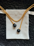 TT original-necklace-Understated luxury black and gold necklace | Gold braided long chain | Black gemstone tassel pendant | Stackable light luxury necklace