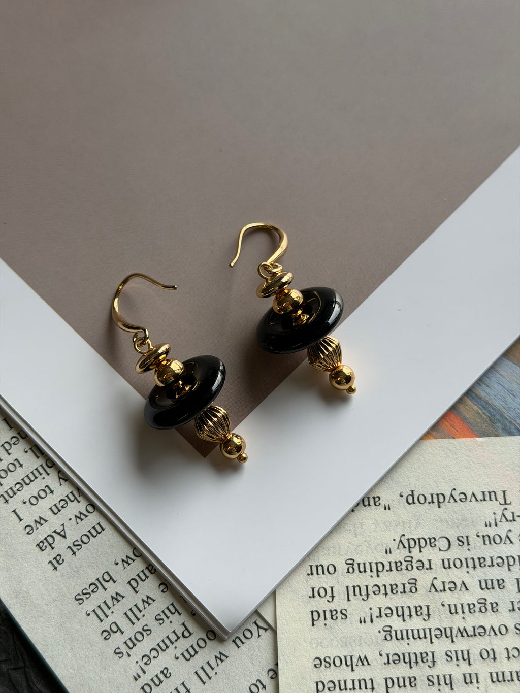 TT original-earring-Black onyx gold pendant earrings | Elegant and unique women's jewelry | French hook-shaped lantern pendant earrings