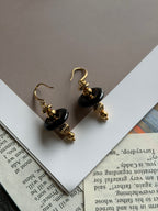 TT original-earring-Black onyx gold pendant earrings | Elegant and unique women's jewelry | French hook-shaped lantern pendant earrings
