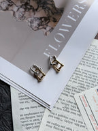 TT original-earring-Gold clasp earrings | Lock-shaped earrings | Industrial minimalist jewelry | Unisex | Two-tone gold and silver
