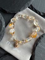 TT original-bracelet-Natural-looking, transparent, irregularly shaped citrine bracelet with cracks | Auspicious design for attracting wealth and good fortune | Chinese-style bracelet symbolizing blessings, prosperity, and wealth | High-end feel