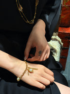 TT original-Bracelet-Women's Gold Pearl Bracelet | Chunky-chain vintage design featuring pearls and tassel charms | Elegant, luxurious statement jewelry
