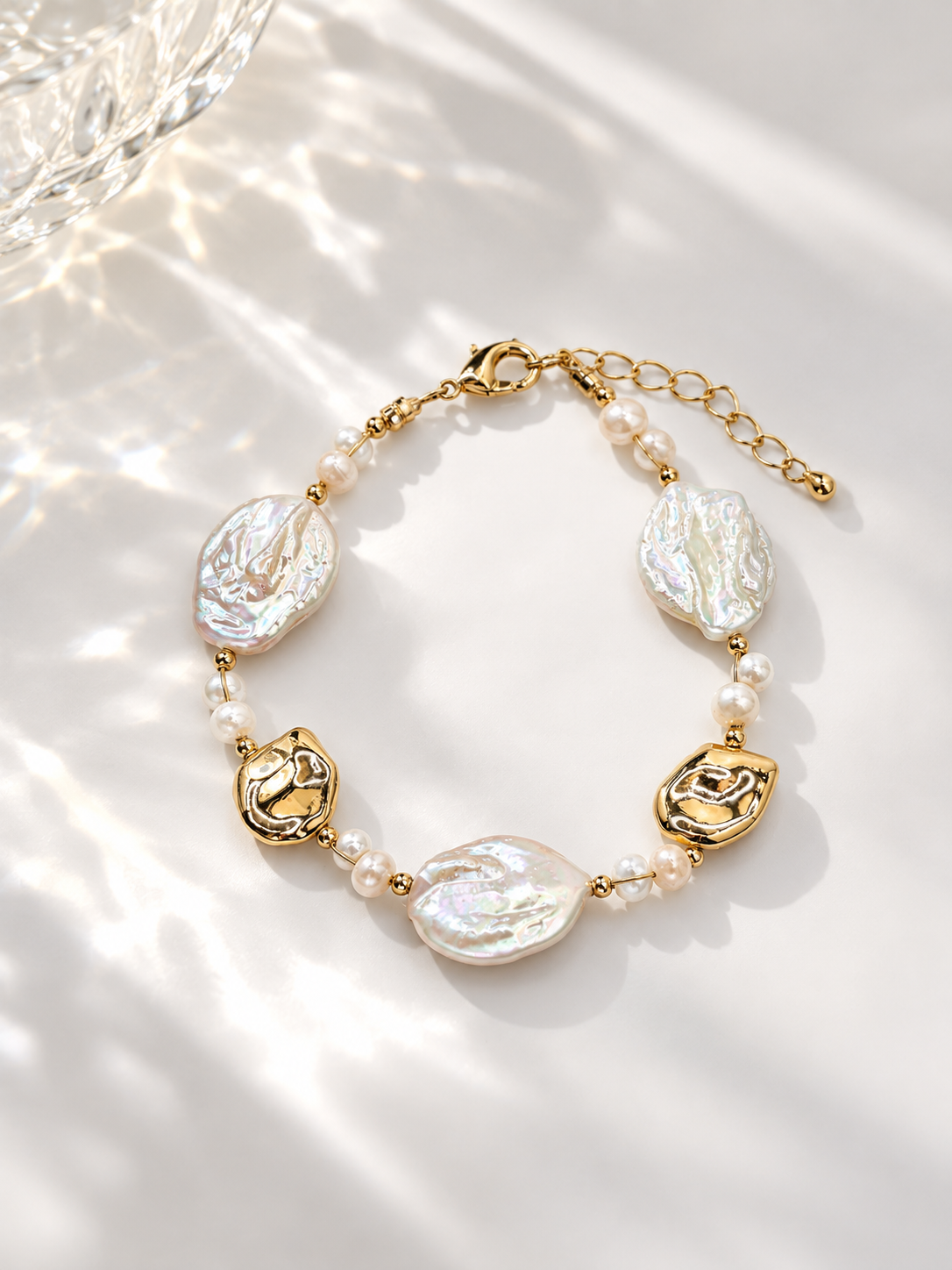 Natural baroque pearl bracelet with gold-tone accents