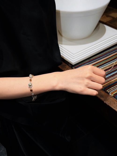 Baroque pearl bracelet worn on the wrist