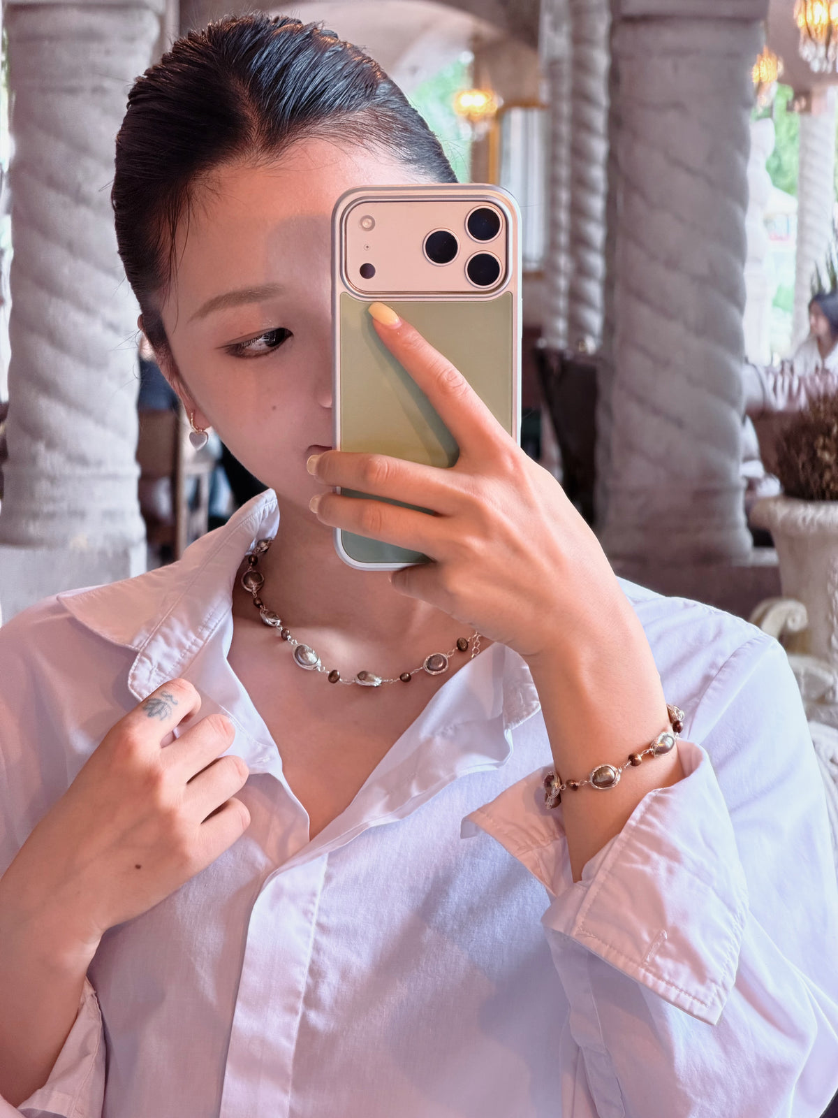 Baroque pearl jewelry styled with an everyday outfit