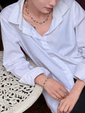 Baroque pearl necklace bracelet set worn around the neckline and wrist