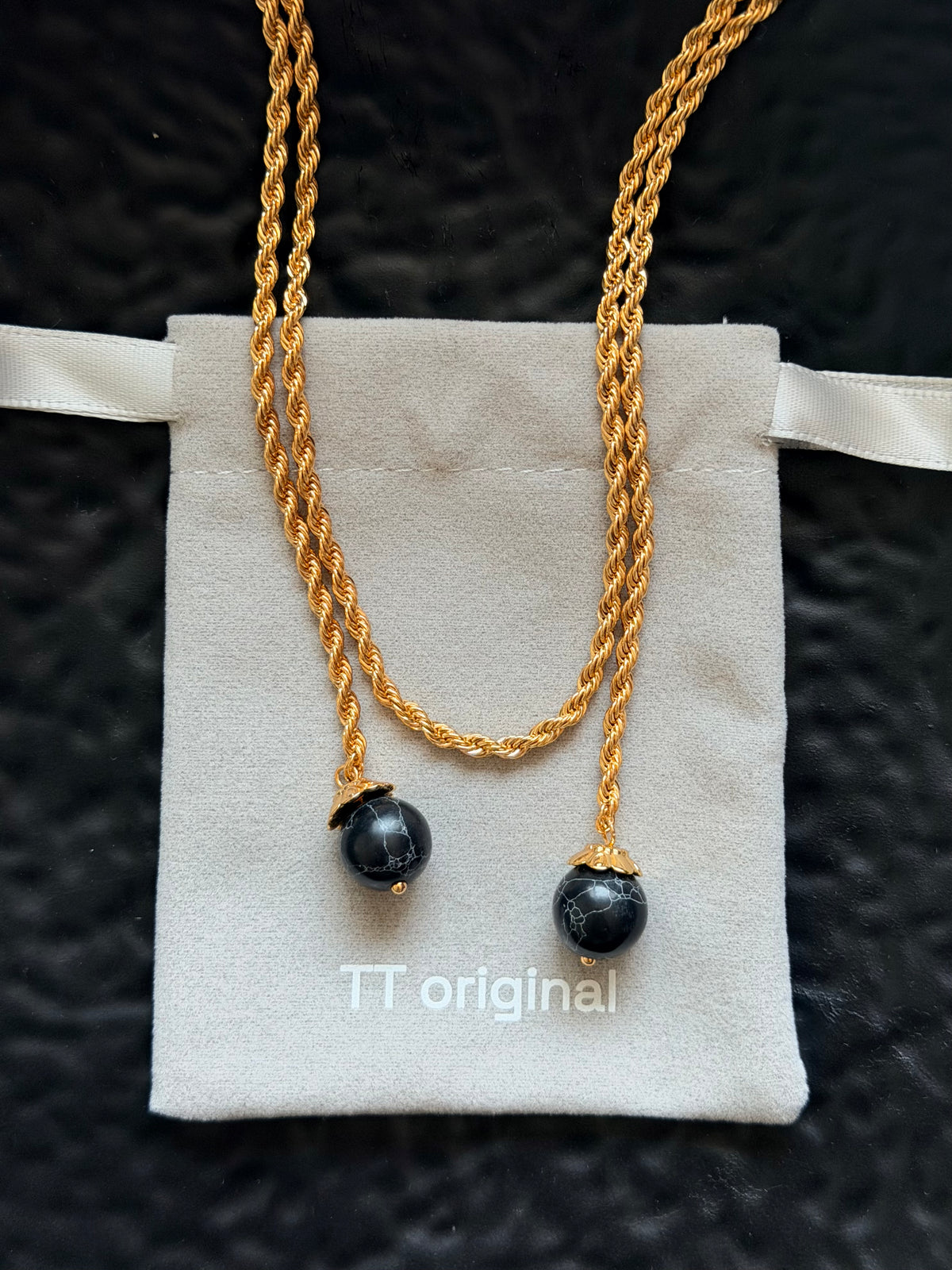 Black and gold braided tassel long necklace