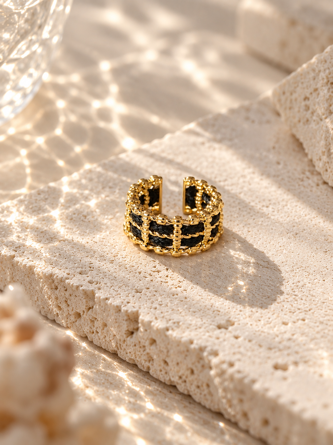 Black and gold openwork adjustable statement ring