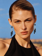 sparkling chain detail on black silver tassel earrings