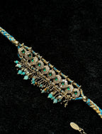 Braided rope bracelet with zircon accents and natural stone tassel details