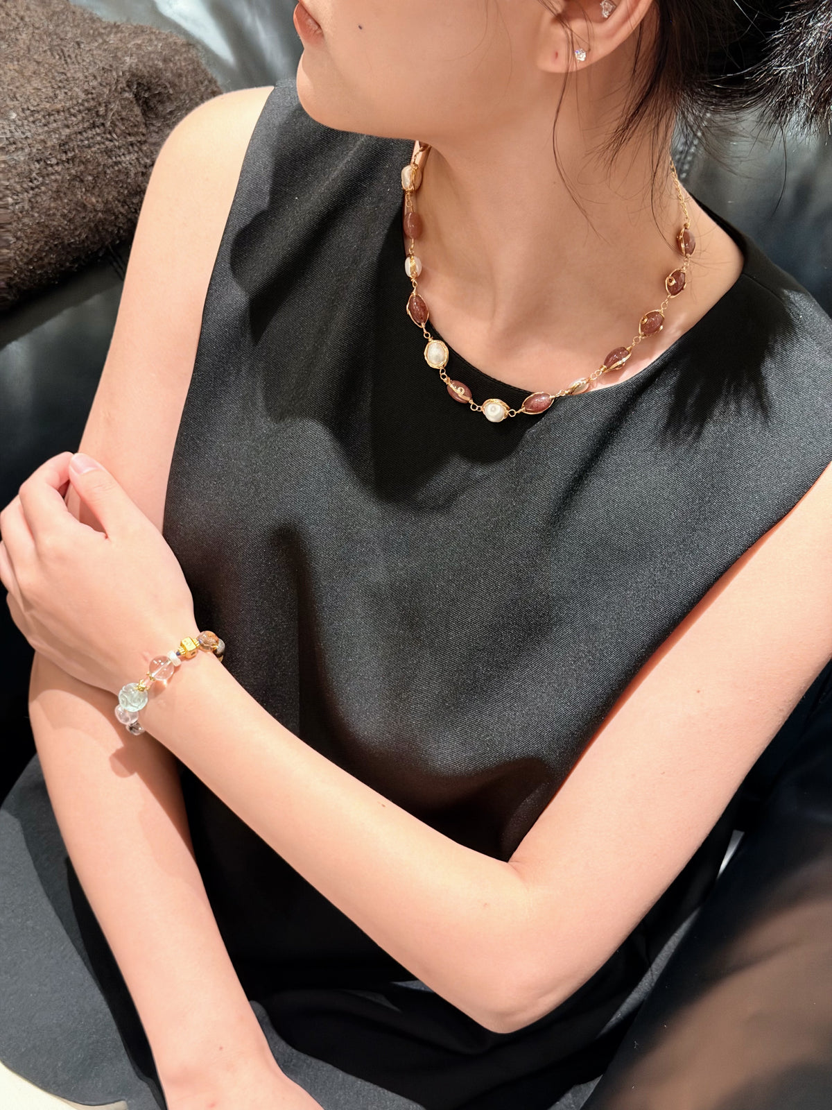 Brown red beads and pearl contrast on necklace