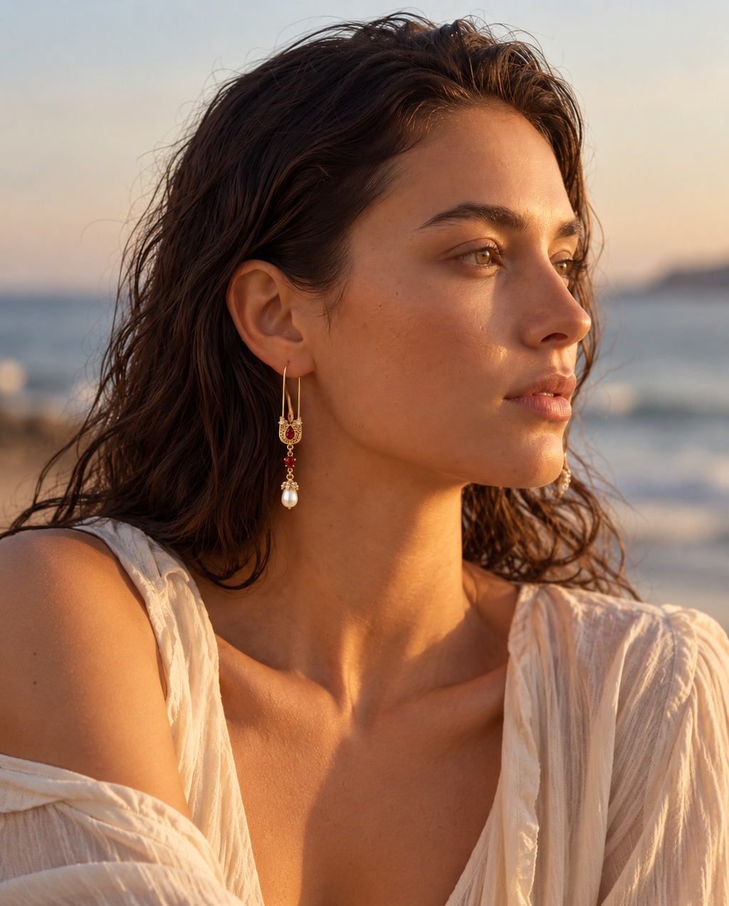 U-shaped gold ear hook on vintage pendant earrings