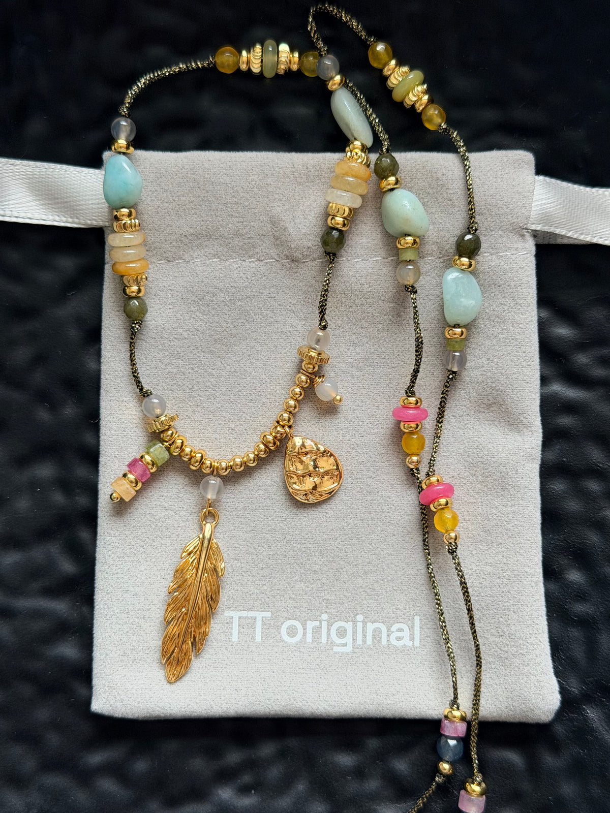 Colorful natural stone details on long bohemian necklace