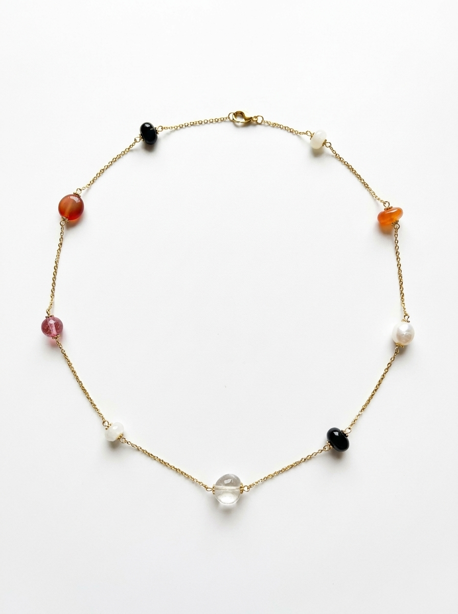 Colorful stone arrangement on long necklace