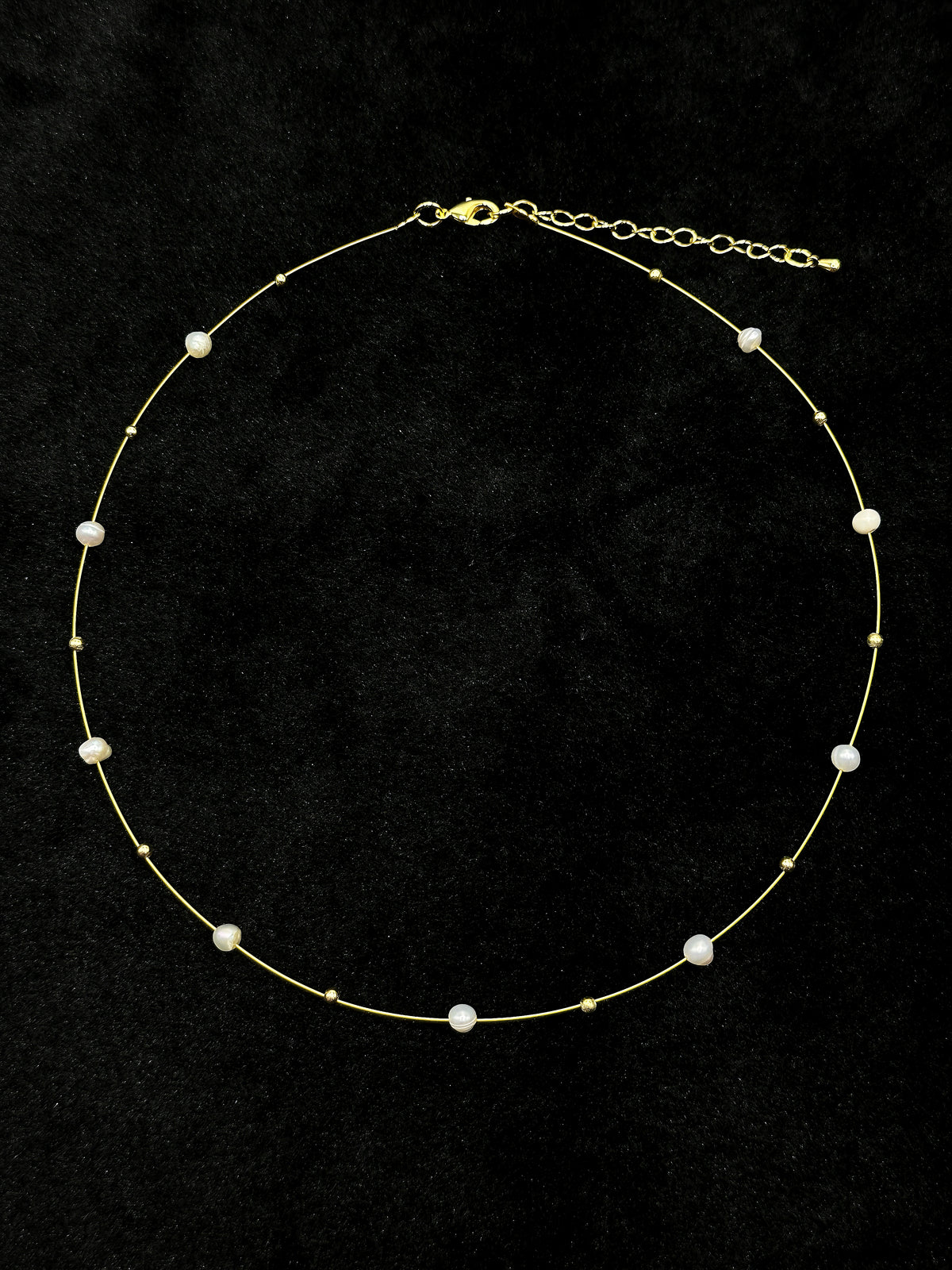 Freshwater pearl gold thread necklace with delicate gold beads