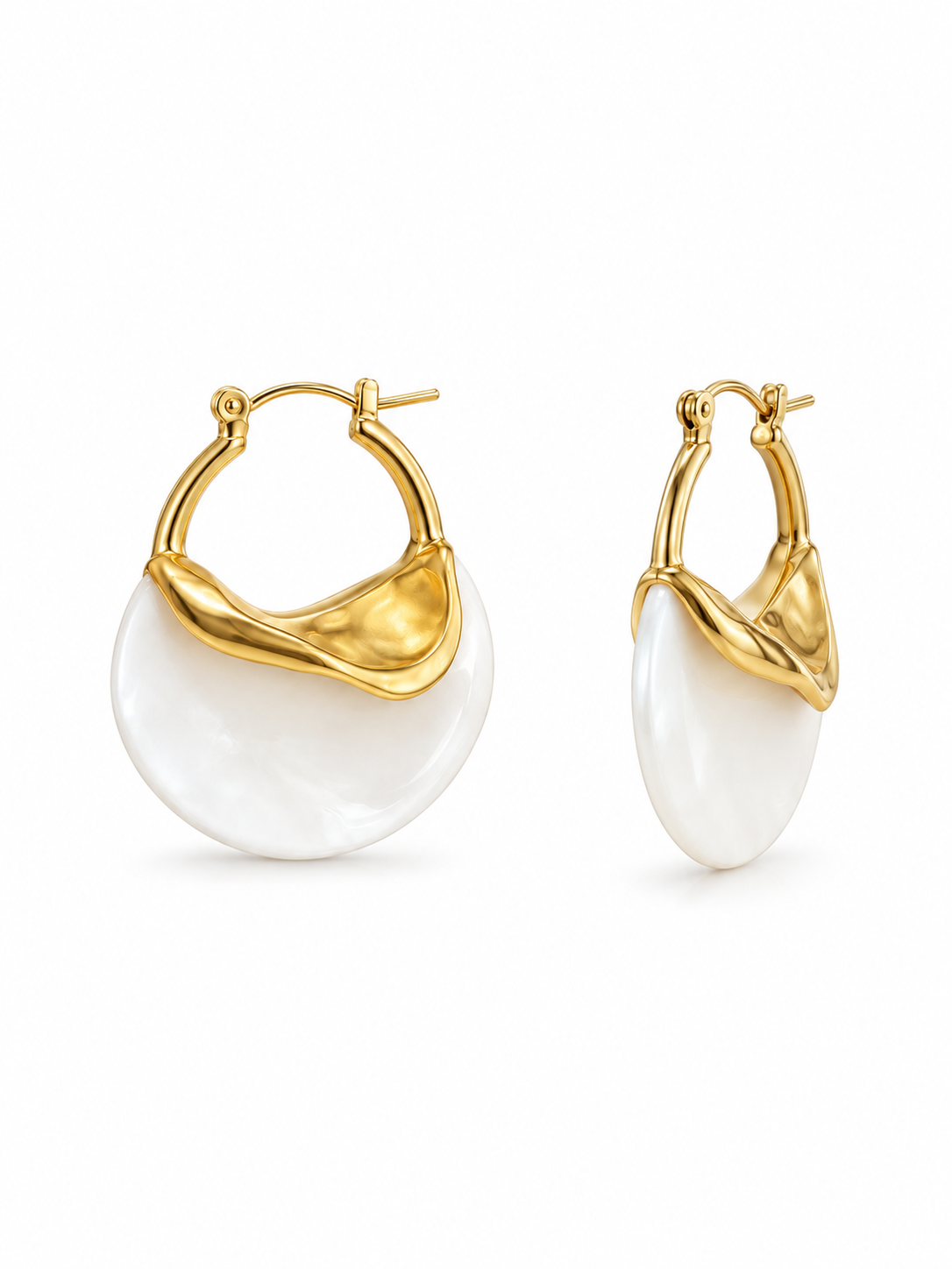 irregular curved gold metal detail on sculptural earrings