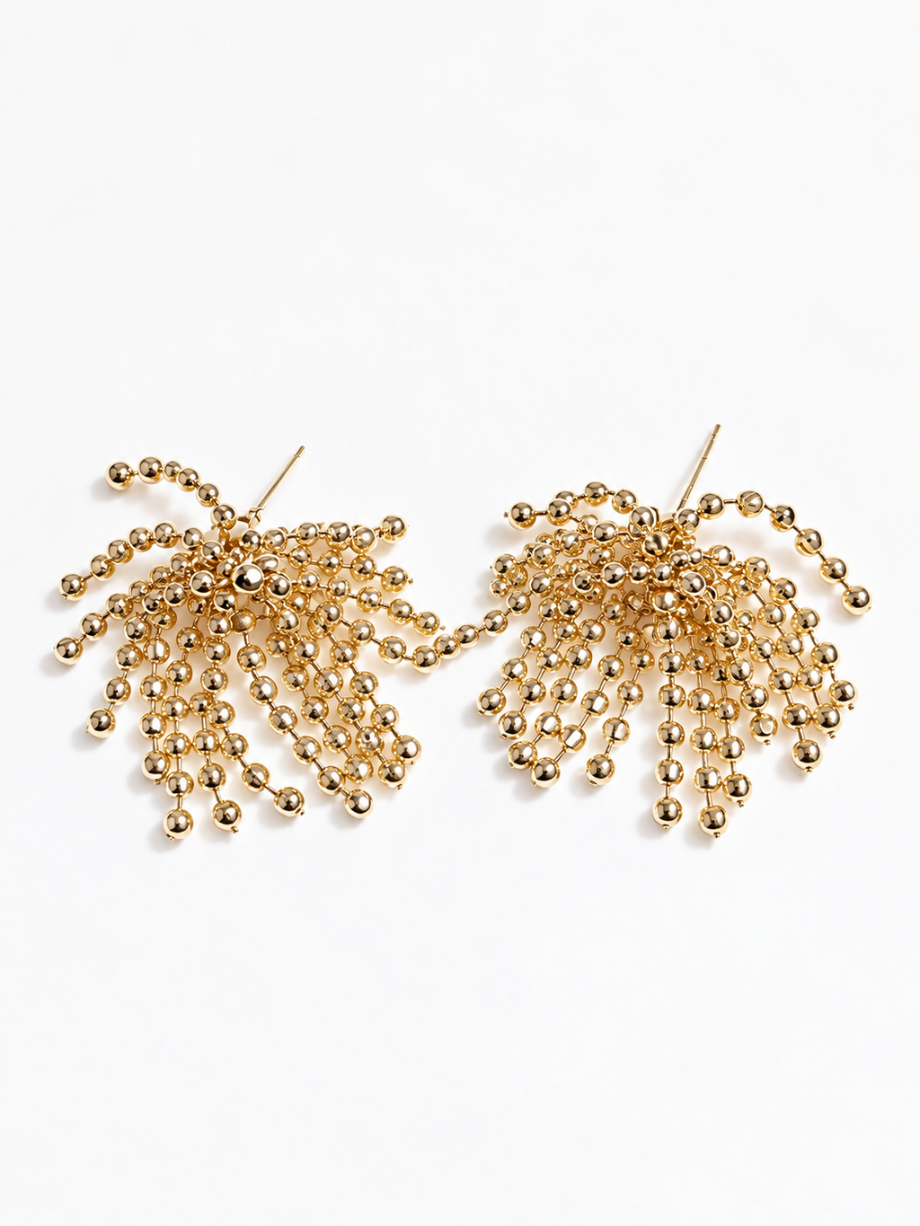 gold beaded tassel earrings with firework-inspired design