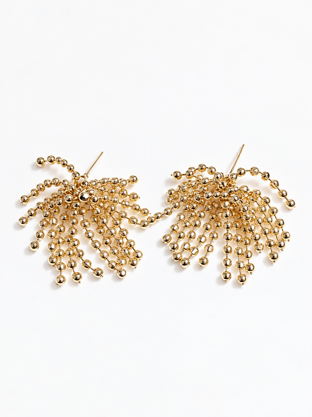 gold beaded tassel earrings with firework-inspired design