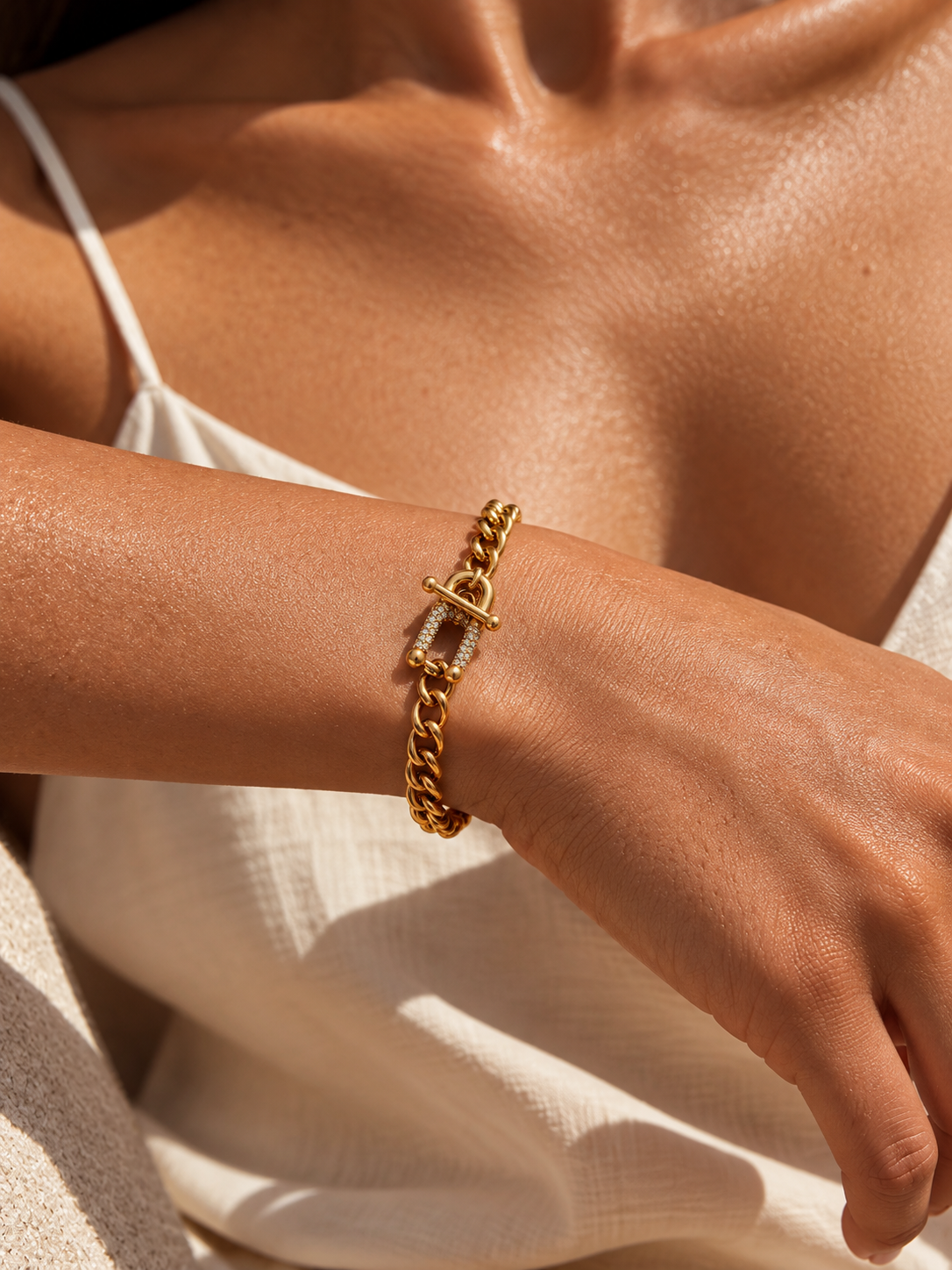 Gold Cuban bracelet worn on the wrist