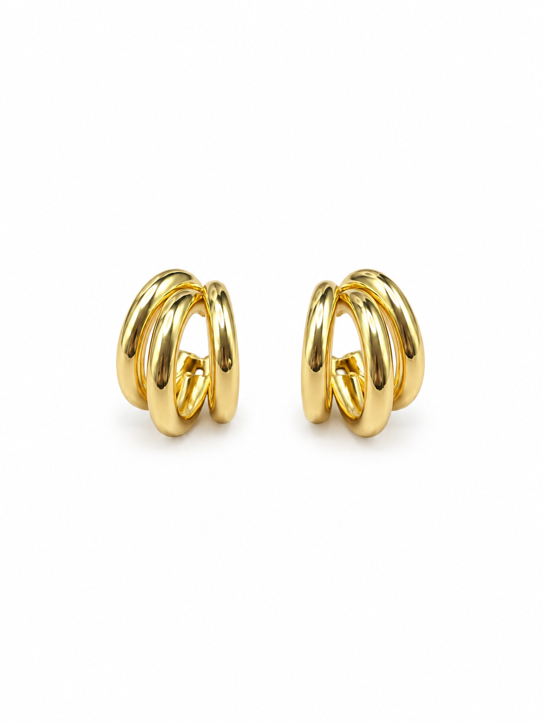 gold sculptural hoop earrings with curved metal lines