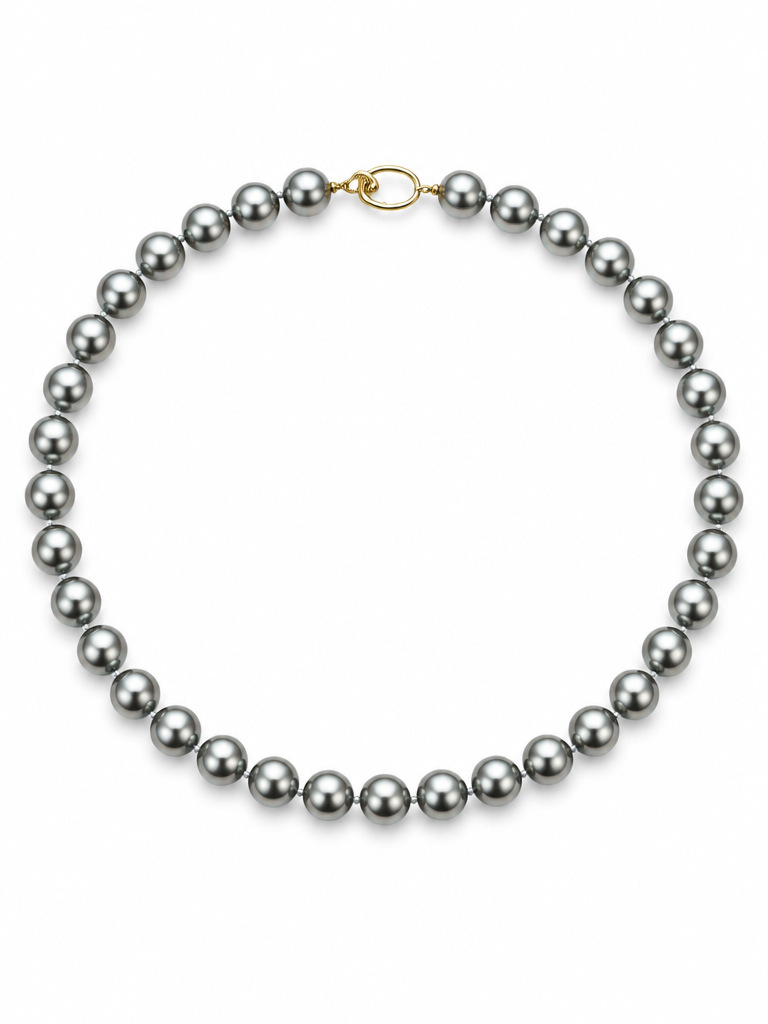 Gold-tone clasp on silver grey pearl necklace