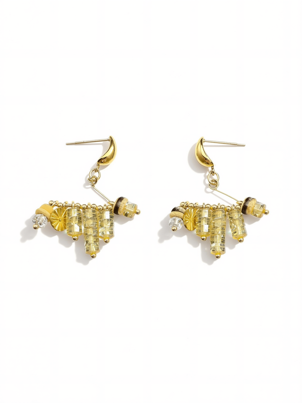 Close-up of natural stone and gold bead details on tassel earrings