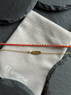 Lucky red string bracelet with gold chain