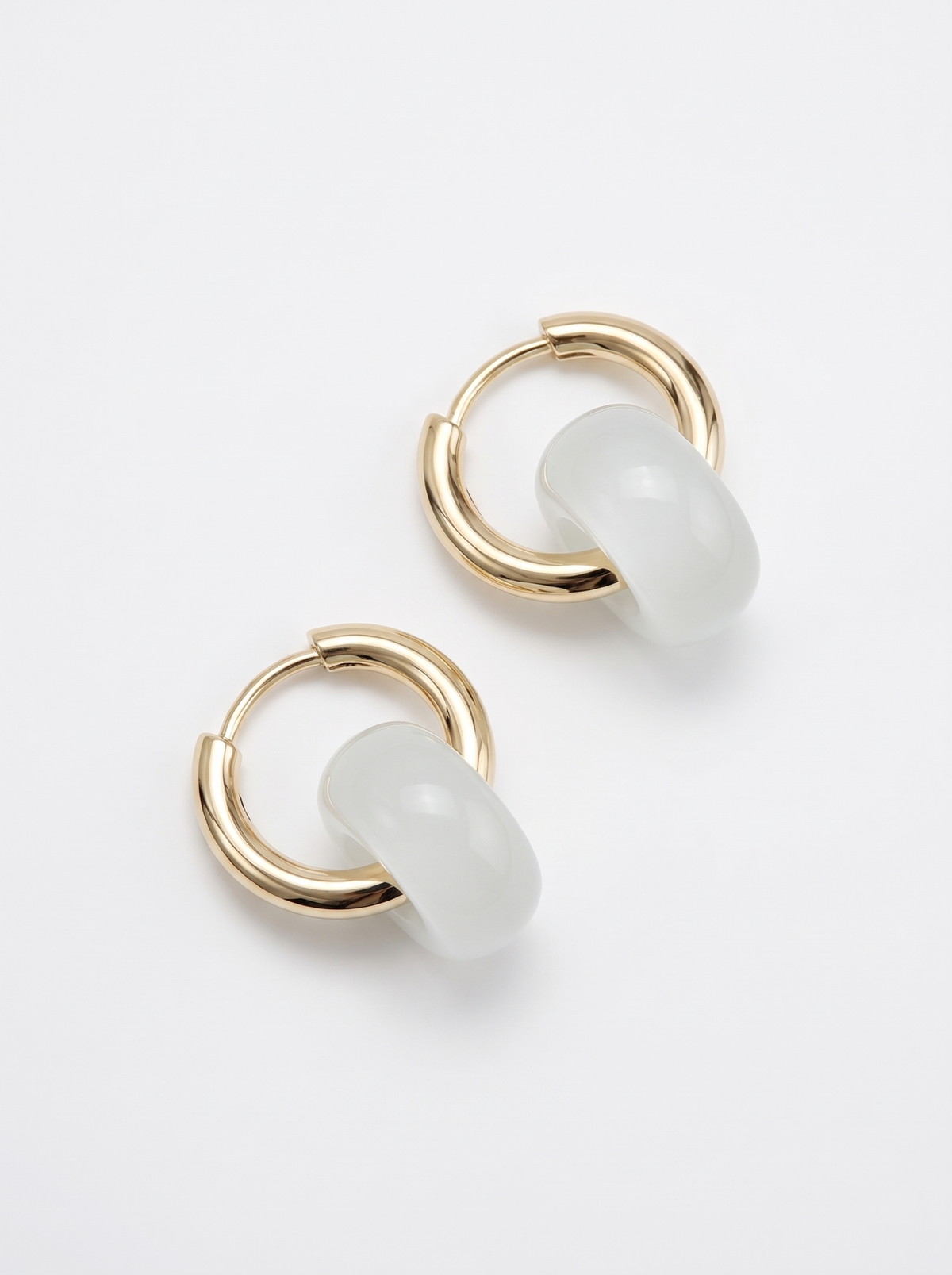 Minimalist gold hoop earrings with geometric gemstone pendant