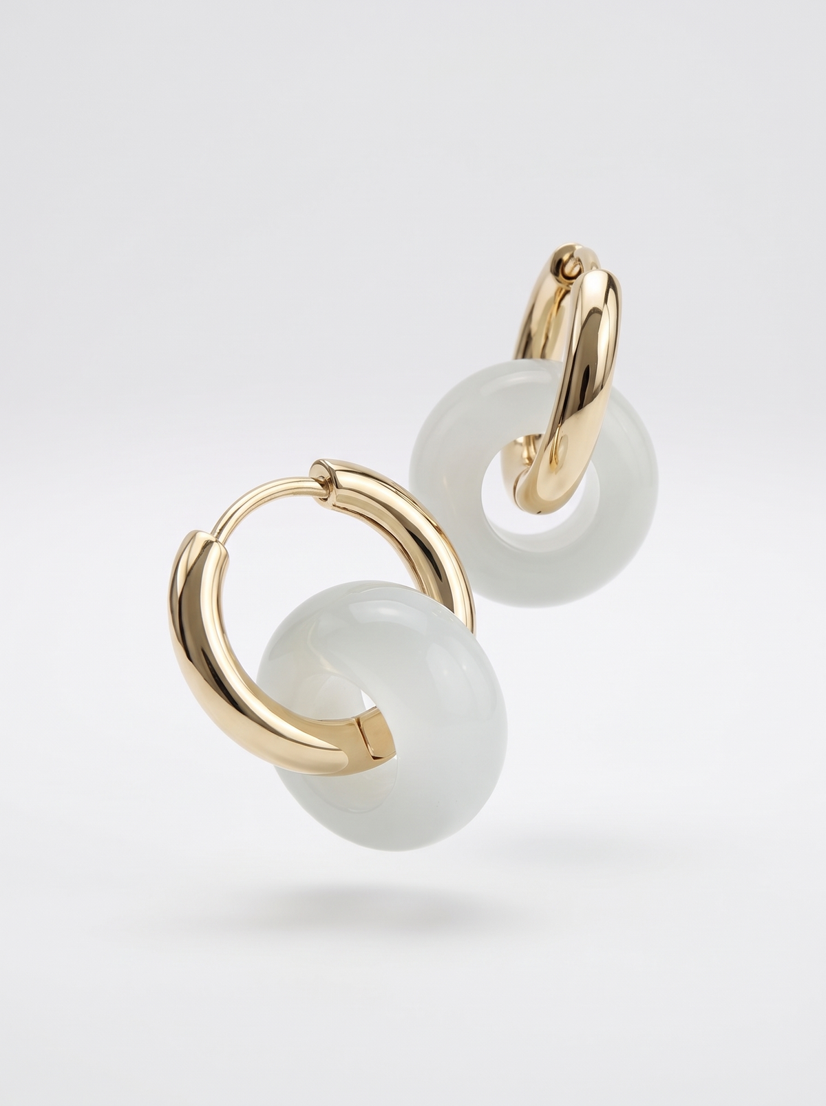 minimalist gold hoop earrings with geometric pendant