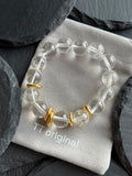 Natural white crystal bracelet with gold accents