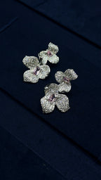 pink teardrop center stone on flower earrings