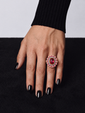 Pink pearl statement ring worn on hand