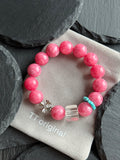 Pink rhodochrosite bracelet with crystal and gold-tone accents
