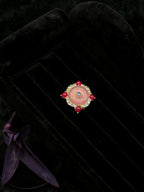 Pink spiral statement ring with colorful center