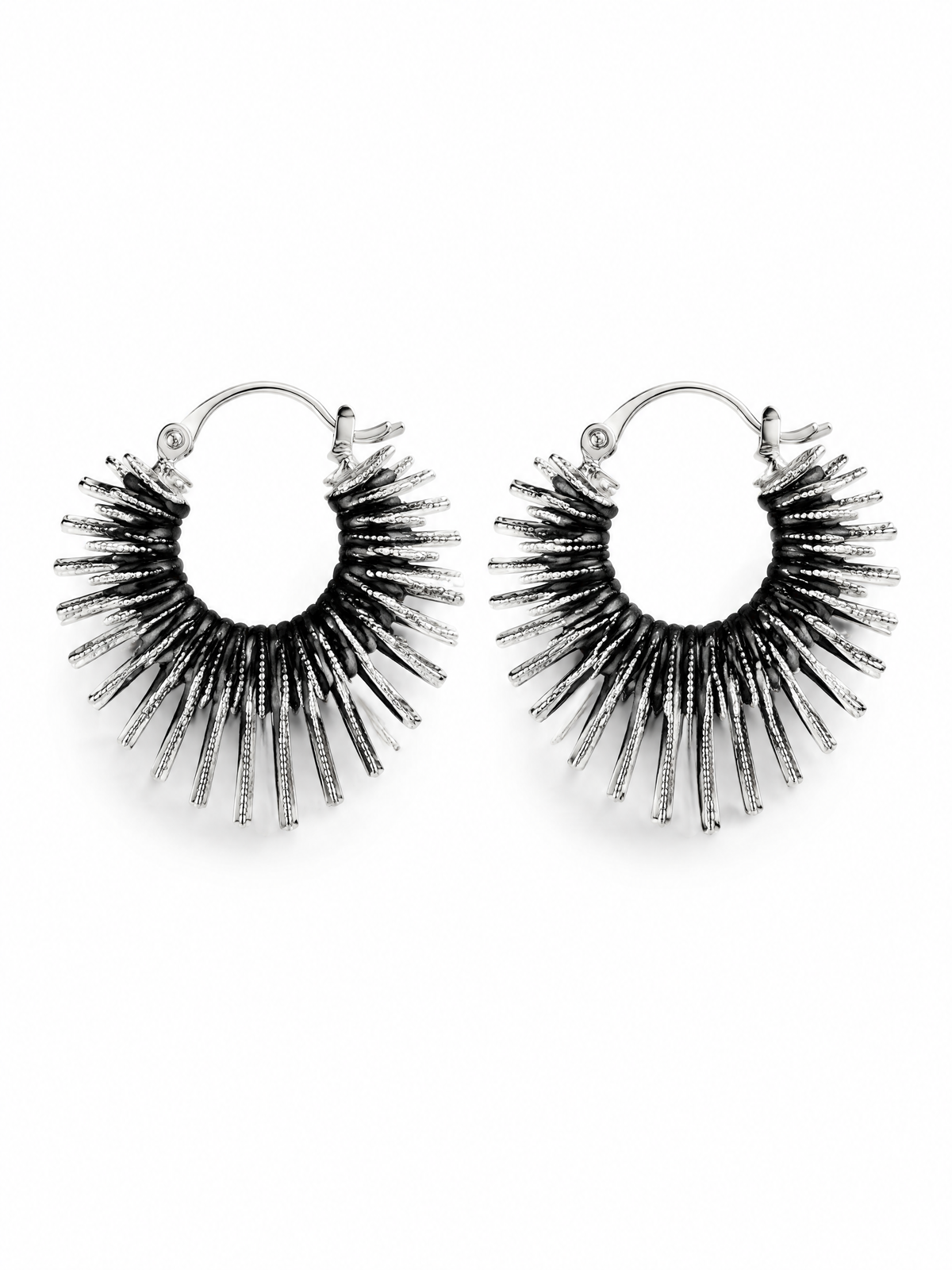 sculptural silver heart earrings with black leather cords