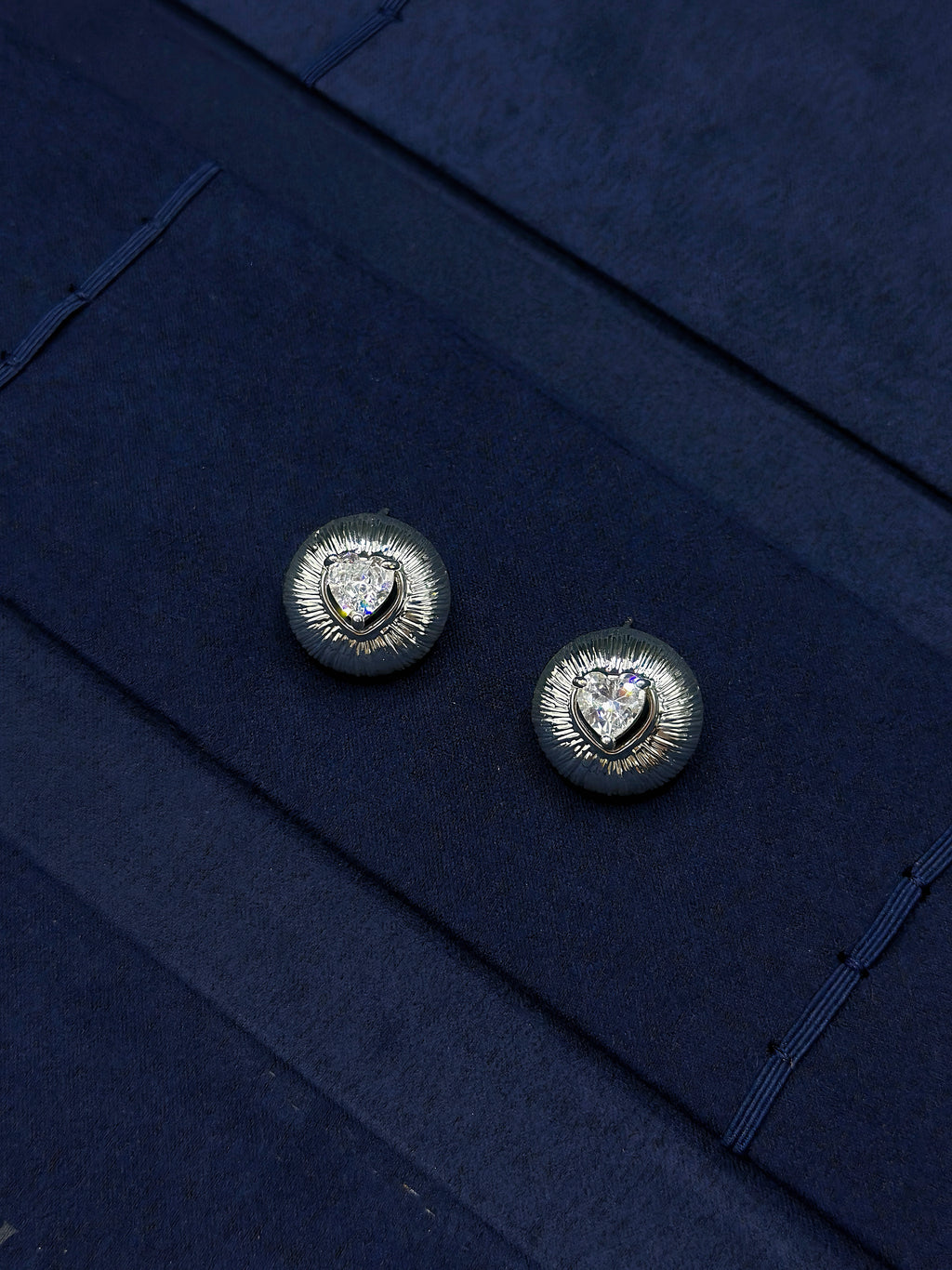 silver heart stud earrings front view