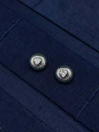 silver heart stud earrings front view