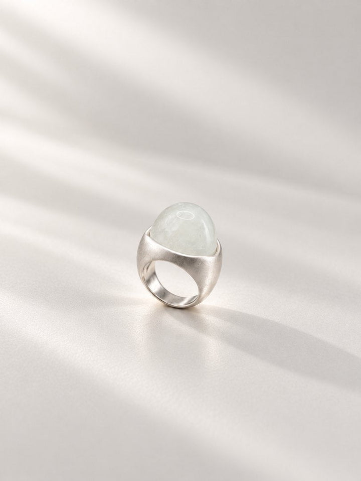 TT Original rings jewelry on a pearl gray background