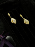 vintage gold drop earrings side view