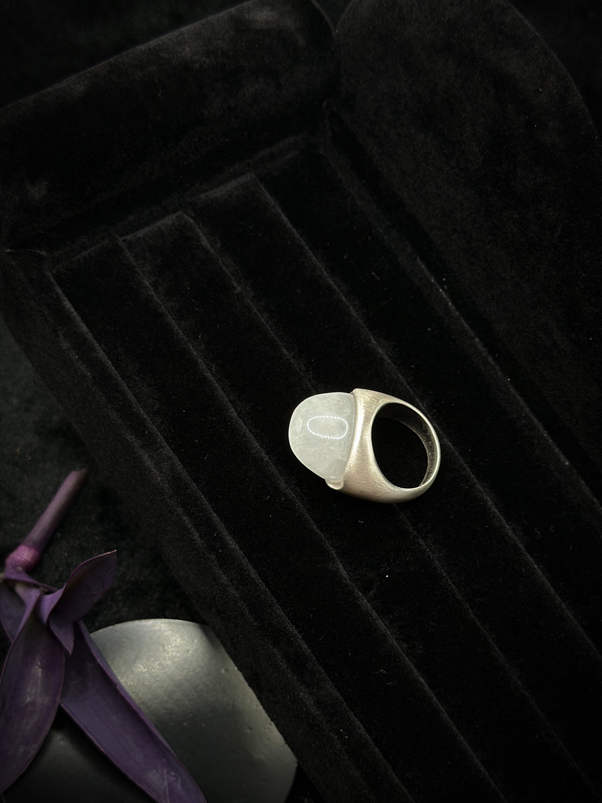 White crystal sculptural statement ring with matte silver-tone band detail