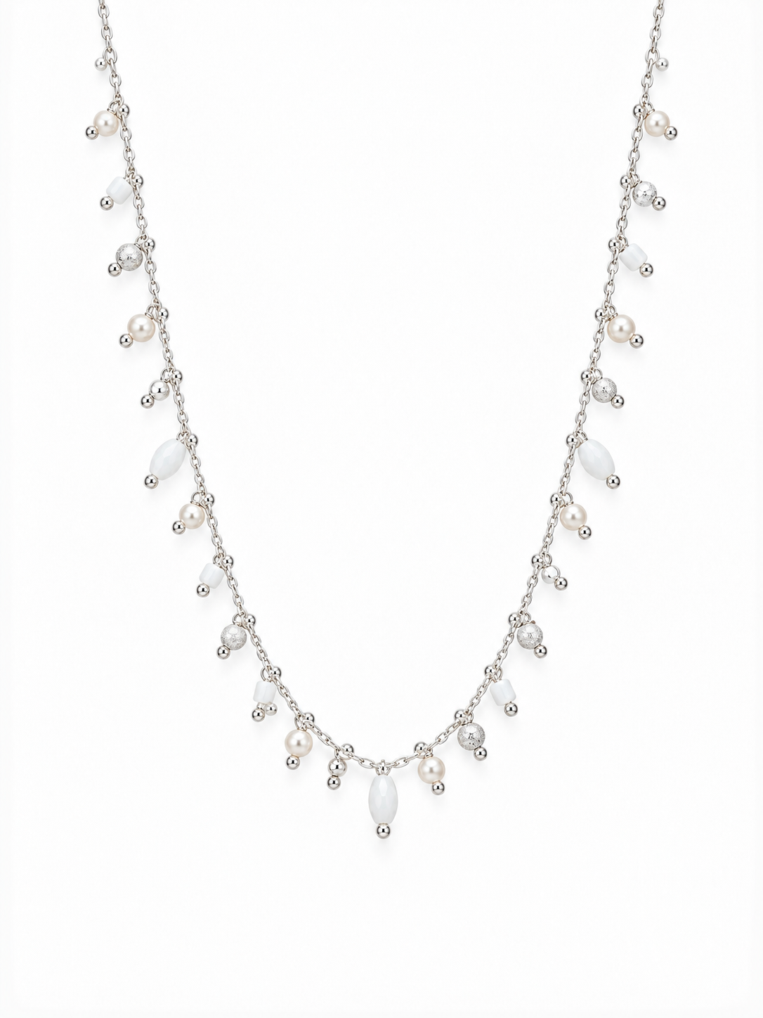 White rice-shaped pendants on silver necklace