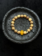 Full view of yellow chalcedony and agarwood bracelet